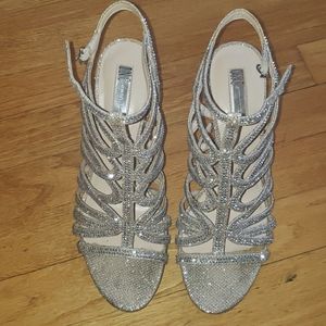 Gold tone high heel shoes